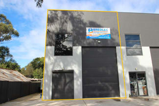 Factory, Warehouse & Industrial commercial property leased at 4/219 Princes Highway Unanderra NSW 2526