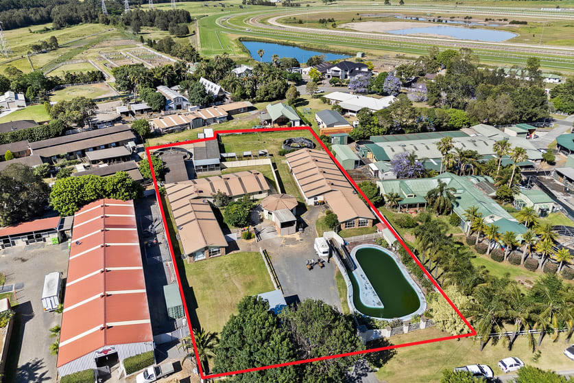 Click to view all images 1a Kingston Town Drive Kembla Grange NSW 2526 - Image 1